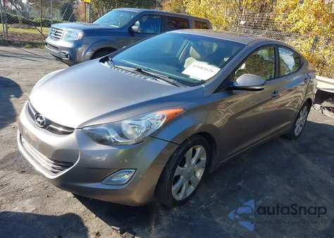 2011 Hyundai Elantra Limited z USA, uszkodzony, nr VIN 5NPDH4AE2BH009607